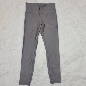 Athleta Elation Shine Tight in color Coffee House size Medium